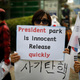 A supporter of Park Geun-hye held a sign in front of a court in Seoul in May 2017.